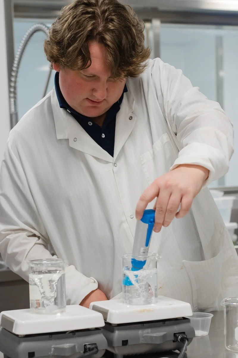 jrw-test-team-with-beakers-beverage
